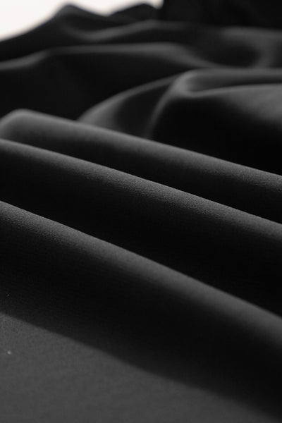 Black Smocked Ruffle Sleeve Blouse